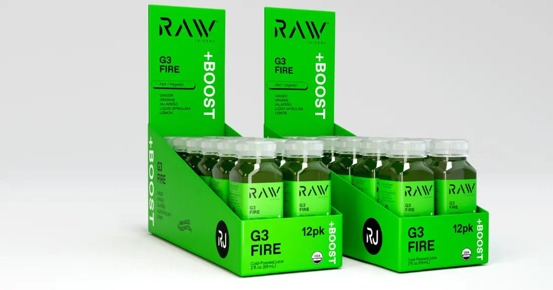 Cold-pressed juice delivery featuring Raw Juicery G3 Fire shots in vibrant green packaging, packed for freshness and convenience.